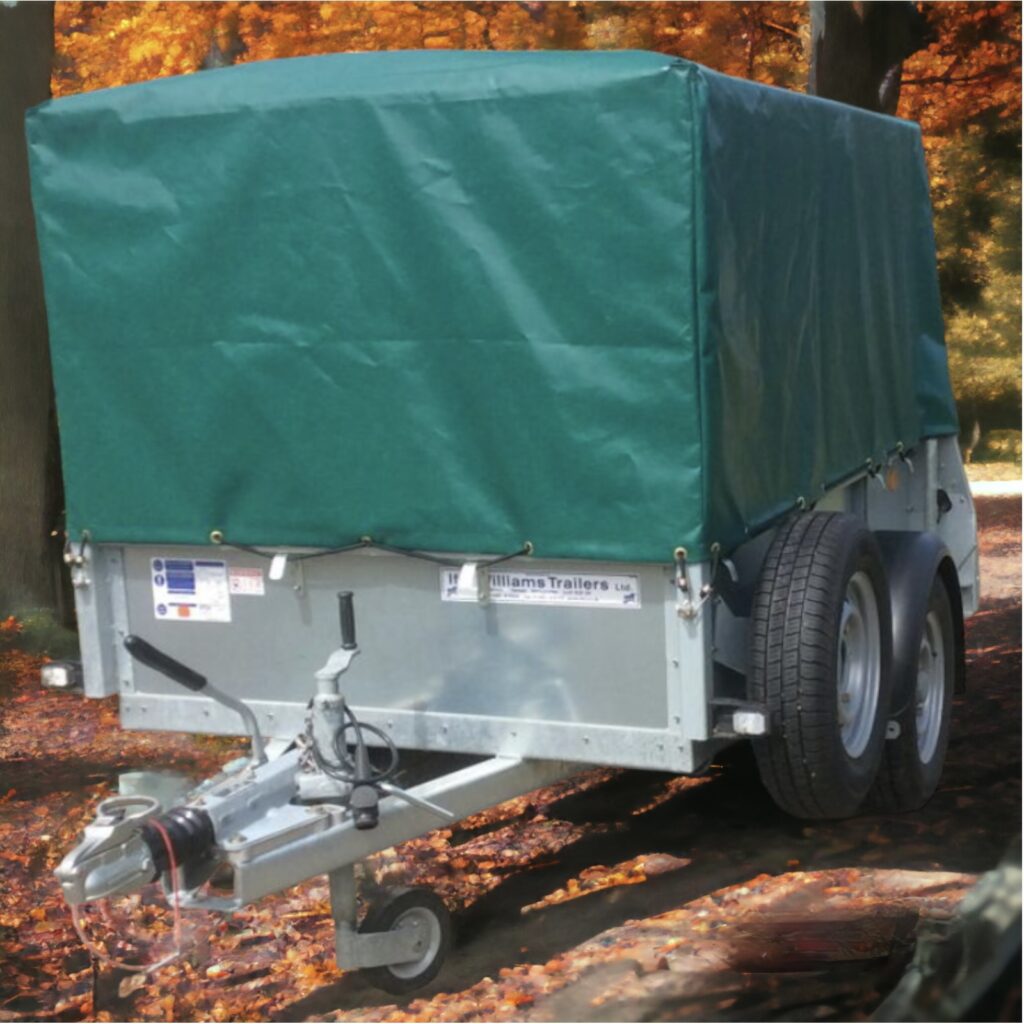 Trailer featuring a green mesh sided cover.